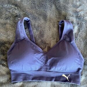 Puma sports bra size S women in dark blue worn and washed once